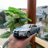 Mô hình xe Nissan GTR 34 chất liệu kim loại ( ảnh shop tự chụp ) tỉ lệ 1:24
