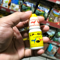 obat ayamLAMPAM  LP OIL MINYAK PENGUAT JALU PENGERAS DAN MEMPERCEPAT PERTUMBUHAN PARUH,TAJI DAN JALU