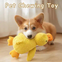 Dog sleeping with a dog hug duck toys to relieve boredom of little yellow duck pet interactive plush