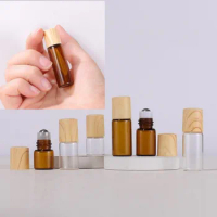 100X 1ml 2ml 3ml 5ml Amber/Clear Glass Roll On Roller Vials Bamboo Cap Essential Oil Bottle Sample Test Bottle With Metal Ball