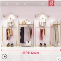 Clothing store display racks gold medal women's shelves hanging clothes shelf on wall display decoration