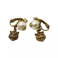 Gucci Pre-Loved GUCCI Brass Clip-On Earrings with Faux Pearl and Tiger Head