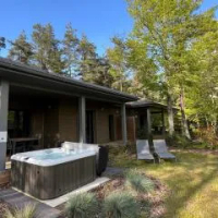 住宿 Lodge familial avec jacuzzi privatif, accès piscine et nombreuses activités au bord du golf - FR-