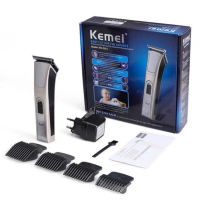 kemei KM5017 บัตตาเลี่ยนตัดผมไร้สาย (มีตัวเลือกลับคม) พร้อมที่รองหวี4ชิ้น ตัดแต่งทรงผมkm5018km1031km