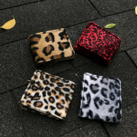 DOMPET MOTIF LEOPARD DENGAN BULU HALUS