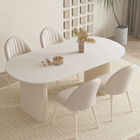 奶油風純白巖板餐桌家用輕奢現代簡約小戶型法式橢圓形餐桌椅組合