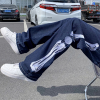 กางเกงยีนส์ผู้ชายโครงกระดูกถุงสบายๆกางเกงยีนบุรุษญี่ปุ่นสไตล์ Streetwear กางเกงยีนส์ขากว้างชายวินเทจกางเกงยีนส์สีฟ้า