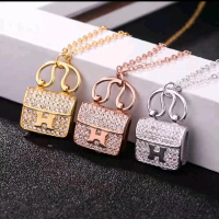 Kalung Titanium Wanita Terbaru Liontin Tas Aksesoris Fashion Wanita Kekinian