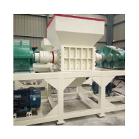 Small shredder for waste textiles carton board composite paper plastic bottle double shaft shredder for garbage recycling