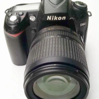 USED,Nikon D90 12.3MP DX-Format CMOS Digital SLR Camera with 18-105 mm f/3.5-5.6G ED AF-S VR DX Nikkor Zoom Lens