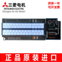 The new Mitsubishi a series PLC module AX40Y50C AX40Y10C I/O module is genuine.
