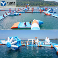 Inflatable water park for adults Custom Commercial Flying Combo Inflatable Water obstacle course Games Floating Toy Water Slide