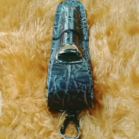 Sarung kulit sapi,pipa once GG dan pipa yang lainya,bermotif 100 % asli,tanpa jahit,kuat,mewah dan e