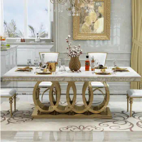 Light luxury marble dining table and chair combination modern simple slate table stainless steel dining table