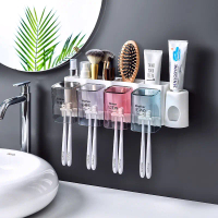 Kệ 4 ngăn đựng kem đánh răng kèm 4 ly, lấy kem vừa đủ 1 cách dễ dàng