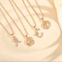 kalung huruf titanium wanita lapis emas berlian