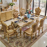European style marble solid wood dining table. Luxury champagne golden rectangular dining table.