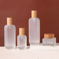 30ML 50ML 100ML 120ML 50G Cosmetic Square Glass Pump Frosted Clear Cream Lotion Bottle and Jar Set with Wood Lid