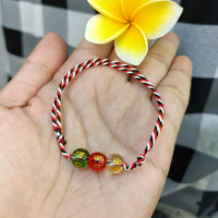 April Gallery - Gelang Tridatu Bali Aesthetic Simple Mewah Benang Hijau Hitam Merah Putih