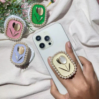 South Korea's small pearl tulip magnetosuction capsules stretching mobile phone shell backpack perso