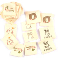 50pcs Beige Clothing Tags Cartoon Print Cotton Woven Labels For Garment Bags DIY Sewing Accessories Shoes Bags Tags c2181