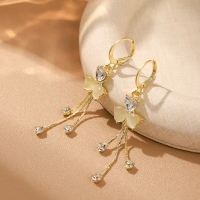 New luxury clover earrings with a high-end feel, cat's eye stone tassel studs, niche four-leaf clove