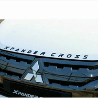 emblem cap mesin xpander cross