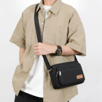 Tas Selempang Pria Multi-Layer – Sling Bag Kanvas Anti Air Ringan, Muat Tablet 12 Inch