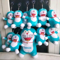 Boneka doraemon M beranak isi 11 ( besar 1, kecil 10) bisa nempel di kaca Dolls