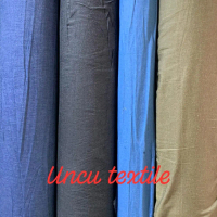 Kain denim khusus untuk gamis, dress, dan kemeja biasanya memiliki karakteristik yang lebih ringan d