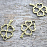 25pcs-- Four Leaf charms,Antique Bronze Filigree Four-Leaf Clover Lucky Flower Charms pendants,jewelry supplies