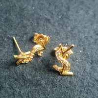 anting kenot titanium Perempuan