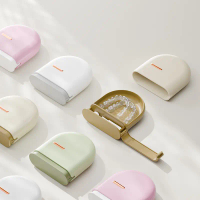 Portable storage box for dentures, adult orthodontic braces, and teeth straighteners.