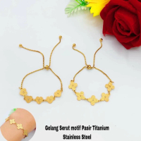 Gelang motif bunga warna emas titanium