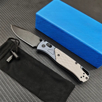 KITH Taps BM — a limited-run Bugout EDC knife with a D2 blade and aluminum handle; folding knife sui