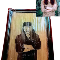 Poto ukiran bambu hitam alami