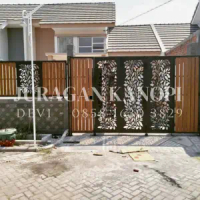 Pagar rumah minimalis motif kayu grc terpasang di surabaya