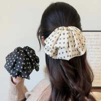 Delicate polka dot bow ponytail clip French elegance