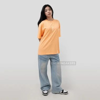 UNIQLO X BILLIE EILLISH ORANGE S