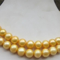 ขนาดใหญ่AAA 9-10มิลลิเมตรแท้south sea golden pearlสร้อยคอ32นิ้วทองเข็มกลัดโรงงานราคาส่งของขวัญผู้หญิงคำเครื...