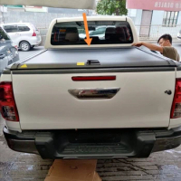 Pickup retractable truck bed shutter cover roller lid tonneau cover for toyota hilux revo rocco vigo gun125 sr5