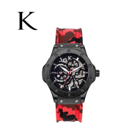 【KLEIN 荷蘭克萊恩】迷彩紅鏤空面板機械矽膠手錶-附限量天然火山石手環