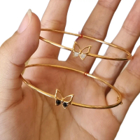 Gelang tangan oval variasi kupu-kupu Bt hitam&putih Dm:5,8 emas kadar 8 karat ubs-tokoemasmelatikedi