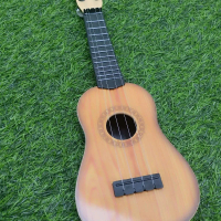 Ukulele Gitar Kecil Mainan Anak 4 Senar Kawat untuk Belajar Musik Anak-anak
