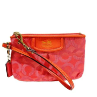 COACH 專櫃款 亮橘色馬車系列織布款材質手拿包-附禮盒