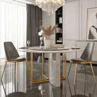 Italian minimalist marble dining table and chair combination round modern light luxury small family round table