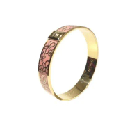 COACH  粉色蝴蝶樣式鍍金琺瑯材質手環-附禮盒