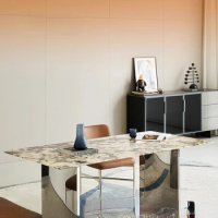 High-end household rectangular marble dining table luxury high-end household minimalist creative dining table.