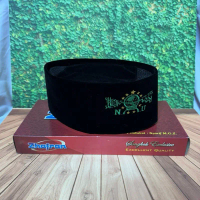 PECI SONGKOK EXCLUSIVE ZHARAN HITAM MOTIF NU HIJAU AC TINGGI 9cm Muslim Kopiah Dewasa Pria  logo