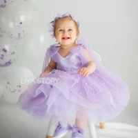 Puffy Purple Flower Girl Dresses Luxury Pearls Tiered Children Birthday Party Gowns with Bows Fluffy Ball Gown Photo Shoot Dress